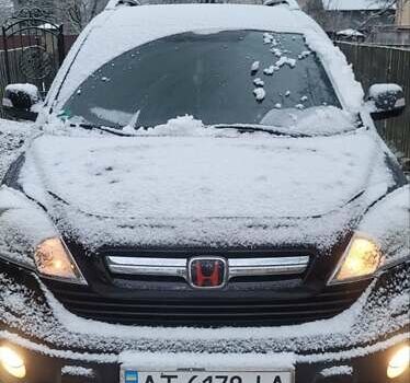 Чорний Хонда СРВ, об'ємом двигуна 2.2 л та пробігом 217 тис. км за 13200 $, фото 31 на Automoto.ua