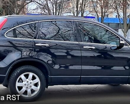 Черный Хонда СРВ, объемом двигателя 24 л и пробегом 153 тыс. км за 10300 $, фото 2 на Automoto.ua