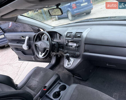 Черный Хонда СРВ, объемом двигателя 2.35 л и пробегом 124 тыс. км за 12000 $, фото 12 на Automoto.ua
