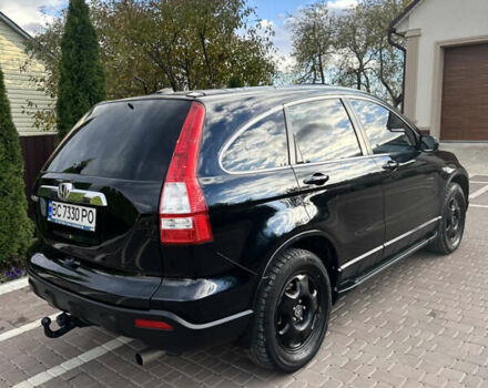 Черный Хонда СРВ, объемом двигателя 2.4 л и пробегом 257 тыс. км за 7950 $, фото 1 на Automoto.ua