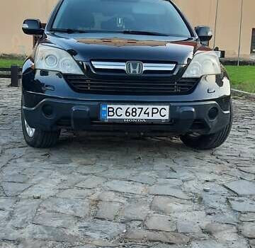 Черный Хонда СРВ, объемом двигателя 2.2 л и пробегом 272 тыс. км за 10700 $, фото 1 на Automoto.ua