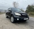 Черный Хонда СРВ, объемом двигателя 2.4 л и пробегом 180 тыс. км за 10200 $, фото 1 на Automoto.ua