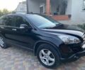 Черный Хонда СРВ, объемом двигателя 2.2 л и пробегом 243 тыс. км за 12500 $, фото 1 на Automoto.ua