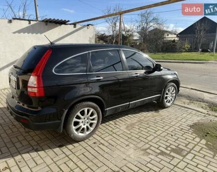 Черный Хонда СРВ, объемом двигателя 2.35 л и пробегом 258 тыс. км за 13500 $, фото 2 на Automoto.ua