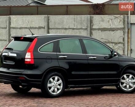 Чорний Хонда СРВ, об'ємом двигуна 2.4 л та пробігом 164 тис. км за 10900 $, фото 1 на Automoto.ua