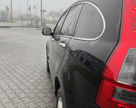 Черный Хонда СРВ, объемом двигателя 2.35 л и пробегом 230 тыс. км за 10400 $, фото 2 на Automoto.ua