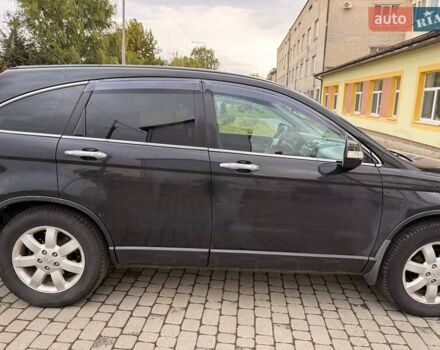 Черный Хонда СРВ, объемом двигателя 2 л и пробегом 202 тыс. км за 12500 $, фото 1 на Automoto.ua