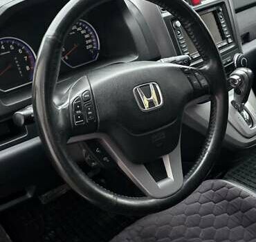 Чорний Хонда СРВ, об'ємом двигуна 2 л та пробігом 234 тис. км за 11299 $, фото 4 на Automoto.ua