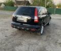 Черный Хонда СРВ, объемом двигателя 2.4 л и пробегом 220 тыс. км за 10700 $, фото 1 на Automoto.ua