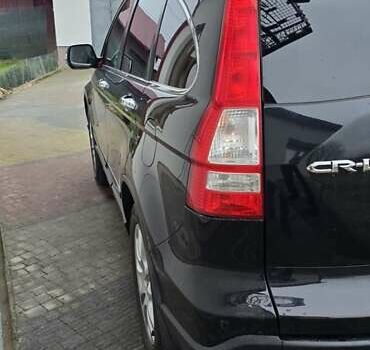 Чорний Хонда СРВ, об'ємом двигуна 2 л та пробігом 234 тис. км за 11299 $, фото 3 на Automoto.ua