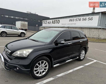 Черный Хонда СРВ, объемом двигателя 2.4 л и пробегом 312 тыс. км за 10000 $, фото 1 на Automoto.ua