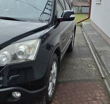 Чорний Хонда СРВ, об'ємом двигуна 2 л та пробігом 234 тис. км за 11299 $, фото 6 на Automoto.ua