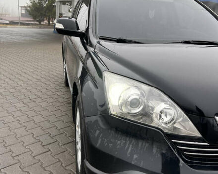 Черный Хонда СРВ, объемом двигателя 2.35 л и пробегом 230 тыс. км за 10400 $, фото 5 на Automoto.ua