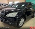 Черный Хонда СРВ, объемом двигателя 24 л и пробегом 178 тыс. км за 11000 $, фото 1 на Automoto.ua