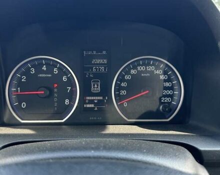 Черный Хонда СРВ, объемом двигателя 2.35 л и пробегом 209 тыс. км за 11300 $, фото 1 на Automoto.ua