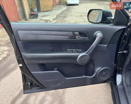 Черный Хонда СРВ, объемом двигателя 2.35 л и пробегом 240 тыс. км за 6900 $, фото 32 на Automoto.ua