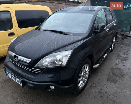 Черный Хонда СРВ, объемом двигателя 2.35 л и пробегом 141 тыс. км за 13000 $, фото 1 на Automoto.ua