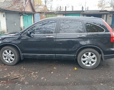 Черный Хонда СРВ, объемом двигателя 2.4 л и пробегом 197 тыс. км за 12000 $, фото 1 на Automoto.ua