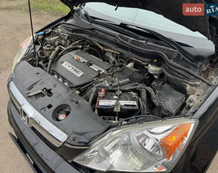 Черный Хонда СРВ, объемом двигателя 2.35 л и пробегом 240 тыс. км за 6900 $, фото 48 на Automoto.ua