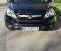 Чорний Хонда СРВ, об'ємом двигуна 2.4 л та пробігом 265 тис. км за 12200 $, фото 1 на Automoto.ua