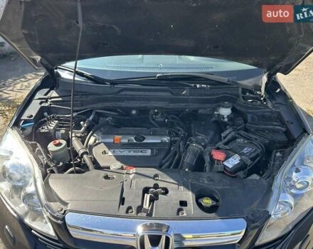 Черный Хонда СРВ, объемом двигателя 2.35 л и пробегом 209 тыс. км за 11300 $, фото 2 на Automoto.ua