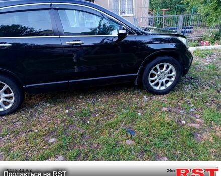 Черный Хонда СРВ, объемом двигателя 2.4 л и пробегом 211 тыс. км за 10500 $, фото 1 на Automoto.ua