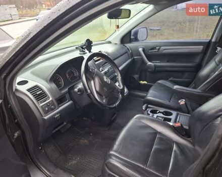 Чорний Хонда СРВ, об'ємом двигуна 2.4 л та пробігом 253 тис. км за 11800 $, фото 4 на Automoto.ua