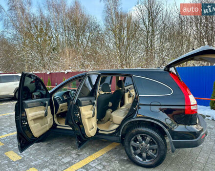 Черный Хонда СРВ, объемом двигателя 2.4 л и пробегом 203 тыс. км за 10400 $, фото 2 на Automoto.ua