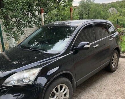 Черный Хонда СРВ, объемом двигателя 2.4 л и пробегом 200 тыс. км за 11000 $, фото 1 на Automoto.ua