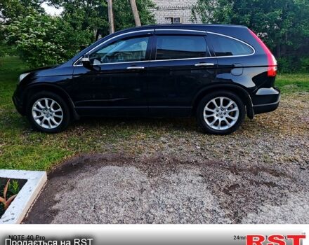 Черный Хонда СРВ, объемом двигателя 2.4 л и пробегом 211 тыс. км за 10500 $, фото 2 на Automoto.ua