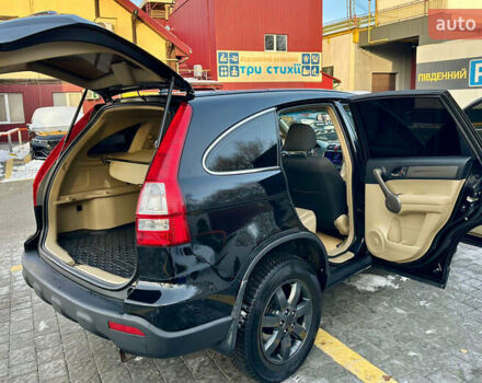 Черный Хонда СРВ, объемом двигателя 2.4 л и пробегом 203 тыс. км за 10400 $, фото 1 на Automoto.ua