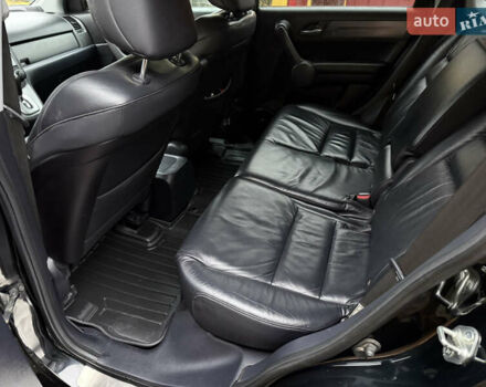 Черный Хонда СРВ, объемом двигателя 2.35 л и пробегом 141 тыс. км за 13000 $, фото 2 на Automoto.ua