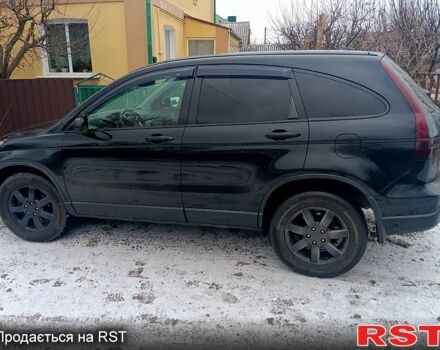 Черный Хонда СРВ, объемом двигателя 2.4 л и пробегом 271 тыс. км за 9600 $, фото 2 на Automoto.ua