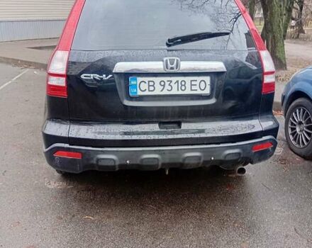 Черный Хонда СРВ, объемом двигателя 2.35 л и пробегом 242 тыс. км за 10500 $, фото 1 на Automoto.ua