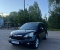 Черный Хонда СРВ, объемом двигателя 2.4 л и пробегом 222 тыс. км за 9900 $, фото 1 на Automoto.ua