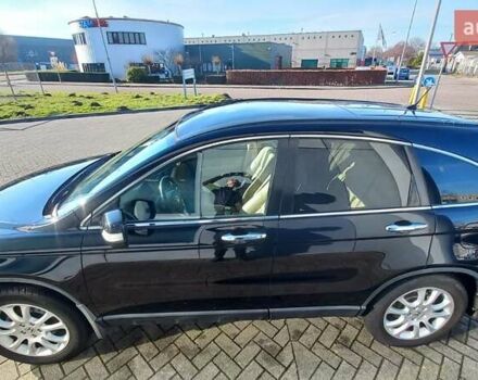 Черный Хонда СРВ, объемом двигателя 2 л и пробегом 157 тыс. км за 13500 $, фото 1 на Automoto.ua