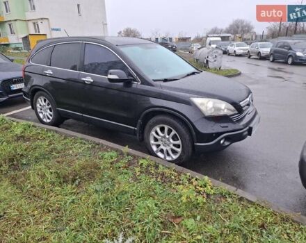 Чорний Хонда СРВ, об'ємом двигуна 2.4 л та пробігом 253 тис. км за 11800 $, фото 1 на Automoto.ua