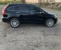 Черный Хонда СРВ, объемом двигателя 2.4 л и пробегом 220 тыс. км за 10700 $, фото 1 на Automoto.ua