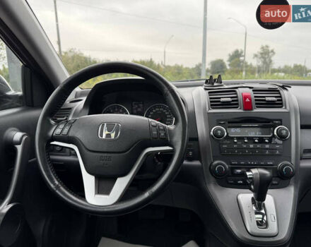 Черный Хонда СРВ, объемом двигателя 2.35 л и пробегом 226 тыс. км за 10800 $, фото 13 на Automoto.ua