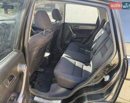 Черный Хонда СРВ, объемом двигателя 2.35 л и пробегом 258 тыс. км за 13500 $, фото 6 на Automoto.ua