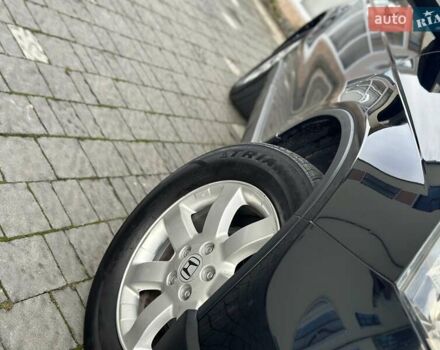 Чорний Хонда СРВ, об'ємом двигуна 2 л та пробігом 191 тис. км за 10450 $, фото 23 на Automoto.ua