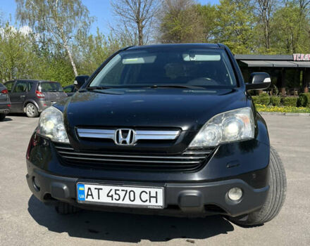 Черный Хонда СРВ, объемом двигателя 2.35 л и пробегом 261 тыс. км за 12000 $, фото 1 на Automoto.ua