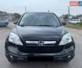 Черный Хонда СРВ, объемом двигателя 2.36 л и пробегом 182 тыс. км за 10600 $, фото 1 на Automoto.ua