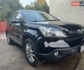 Черный Хонда СРВ, объемом двигателя 2.35 л и пробегом 225 тыс. км за 12999 $, фото 1 на Automoto.ua