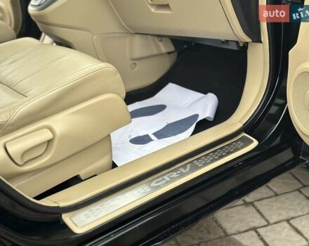 Чорний Хонда СРВ, об'ємом двигуна 2 л та пробігом 181 тис. км за 13777 $, фото 74 на Automoto.ua