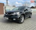 Черный Хонда СРВ, объемом двигателя 2.2 л и пробегом 265 тыс. км за 13500 $, фото 1 на Automoto.ua