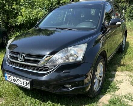 Черный Хонда СРВ, объемом двигателя 2.2 л и пробегом 249 тыс. км за 13400 $, фото 1 на Automoto.ua