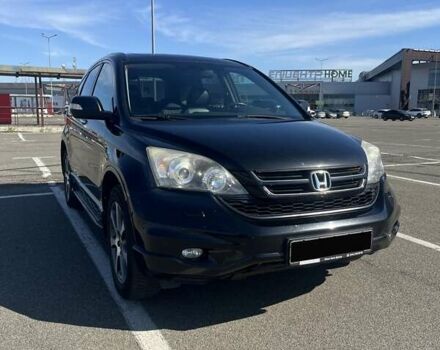 Черный Хонда СРВ, объемом двигателя 2.35 л и пробегом 224 тыс. км за 14500 $, фото 1 на Automoto.ua