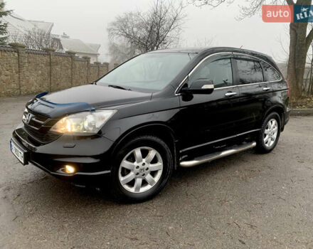 Черный Хонда СРВ, объемом двигателя 2.4 л и пробегом 202 тыс. км за 13700 $, фото 1 на Automoto.ua