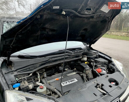 Черный Хонда СРВ, объемом двигателя 2.4 л и пробегом 202 тыс. км за 13700 $, фото 31 на Automoto.ua